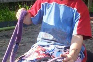 a little boy wearing a hat