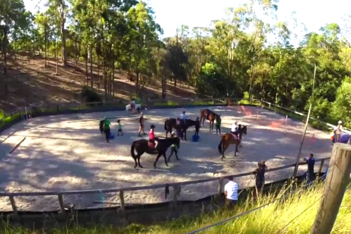a group of people riding on the back of a boat