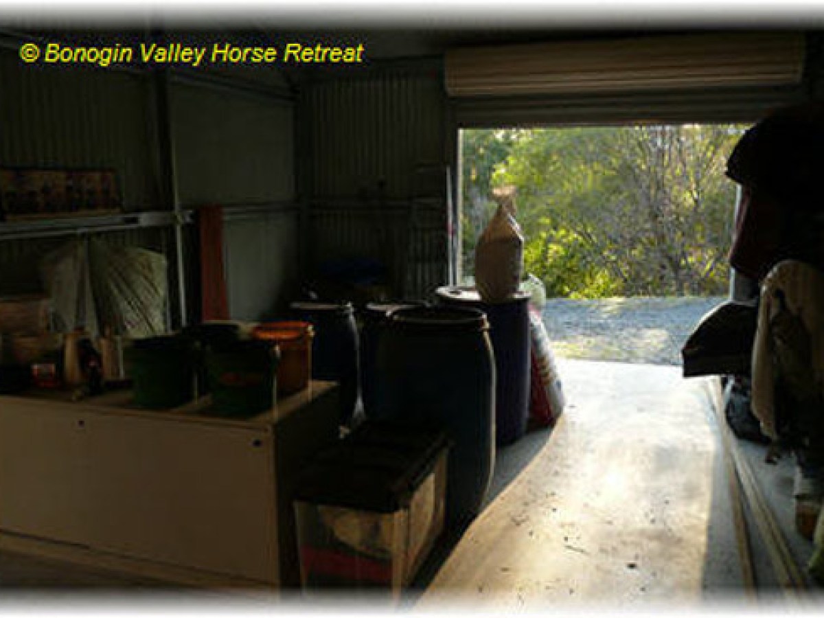 a room filled with furniture and a large window