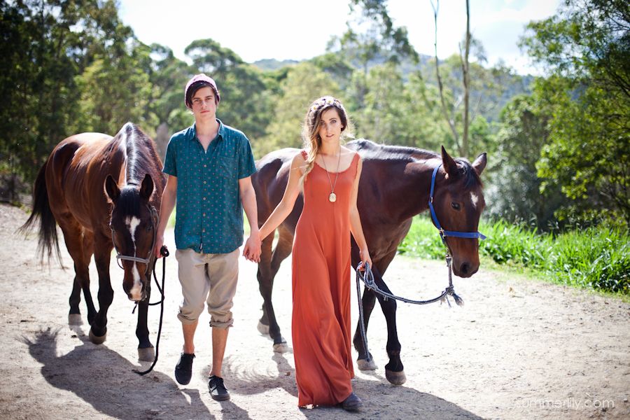 Models walk CascadeCrystal a person leading a brown horse