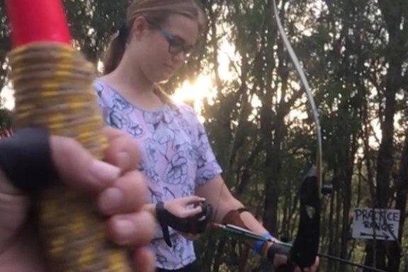 a person holding a child