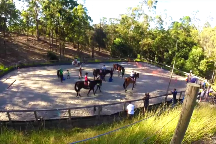 a group of people riding on the back of a boat