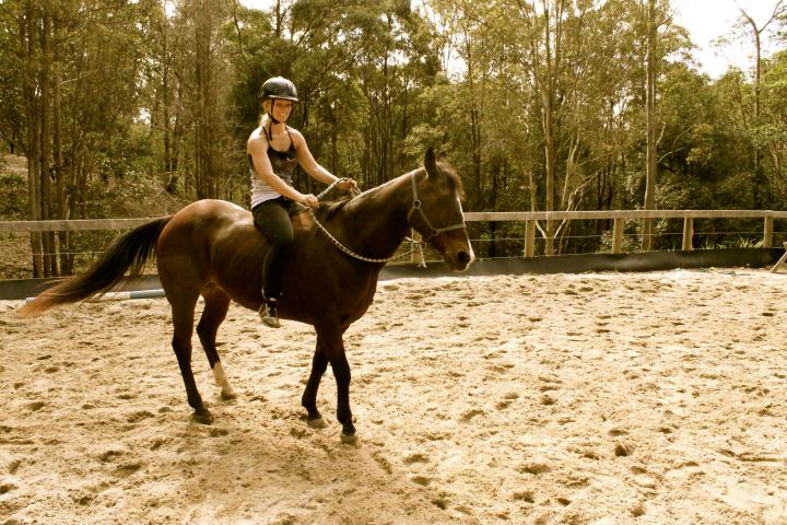 a man riding a horse