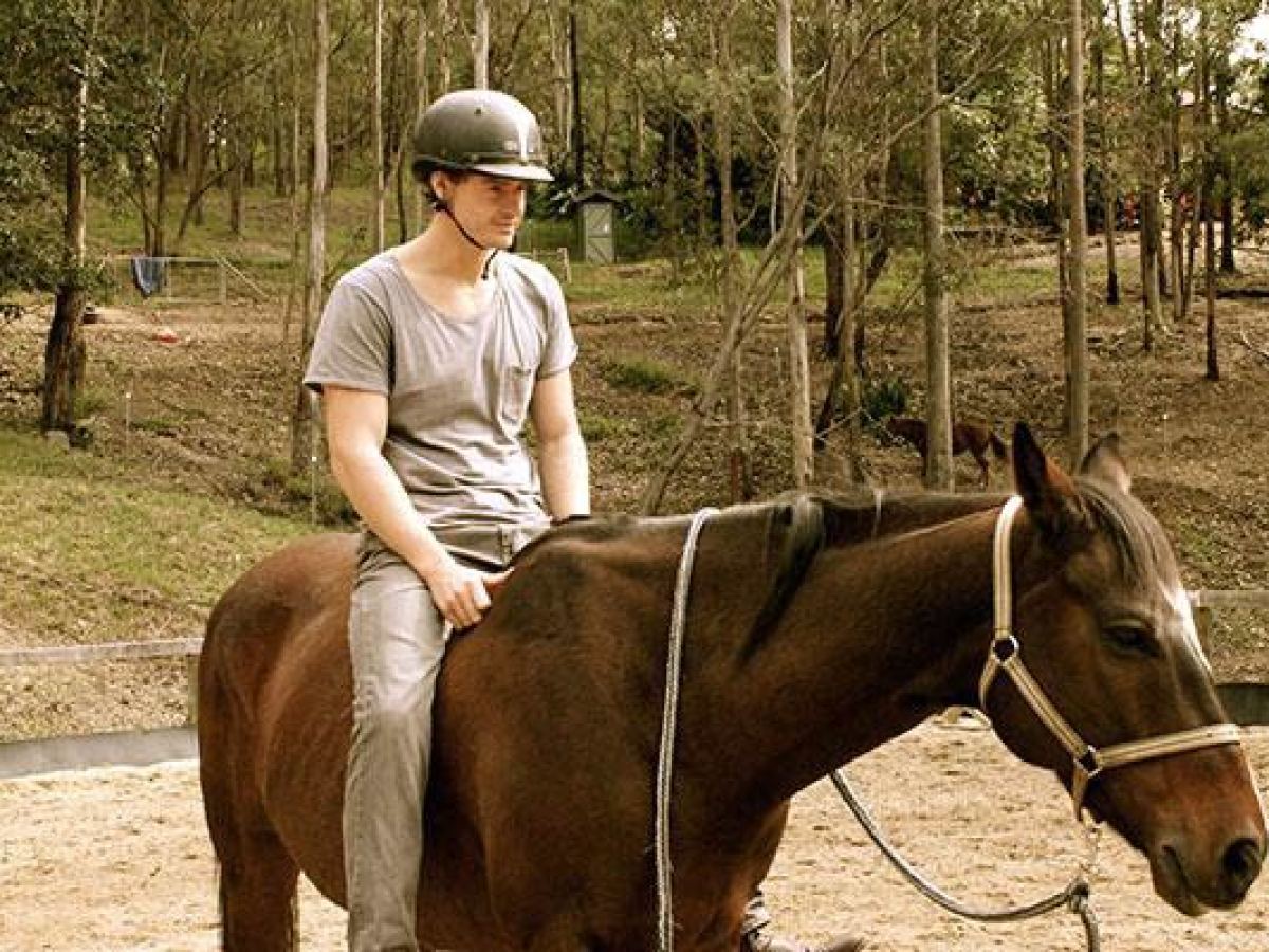 a man riding a horse